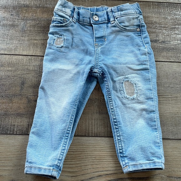 H&M Other - H&M distressed baby jeans with sequin detailing .